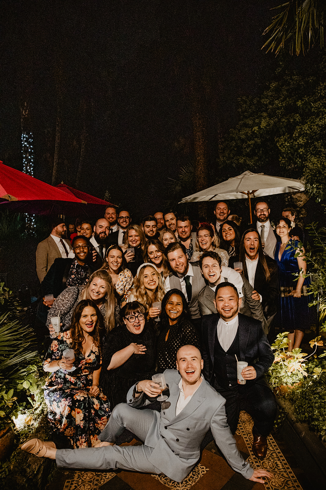 Group photo at a Hampton Court House Wedding. By Olive Joy Photography