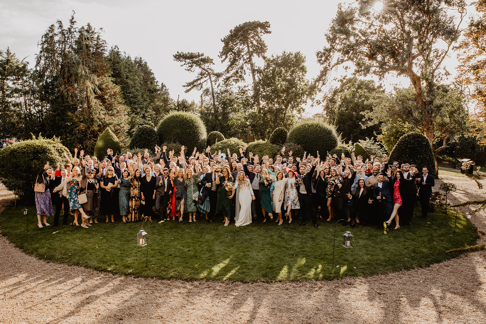 Wedding guests group shot at a Hampton Court House Wedding. By Olive Joy Photography