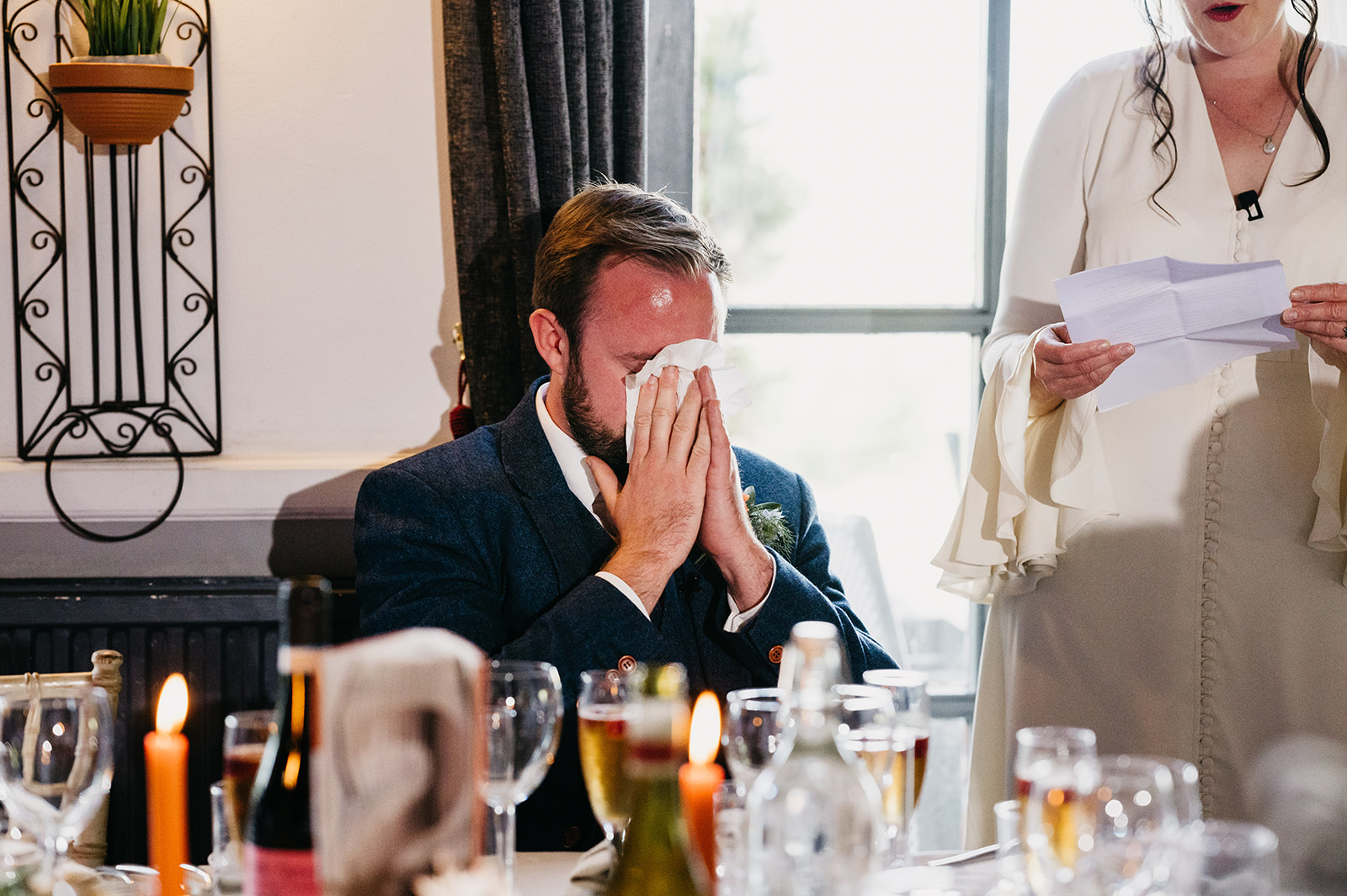 emotional groom during speeches at windmill venue and restaurant in Burford 