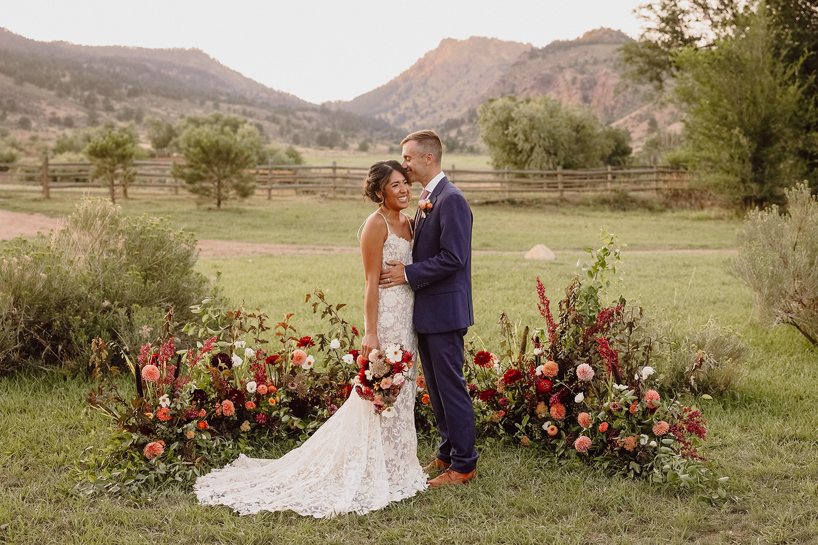 Man and woman holding each other and smiling during a Rocky Mountain Bride Styled Editorial