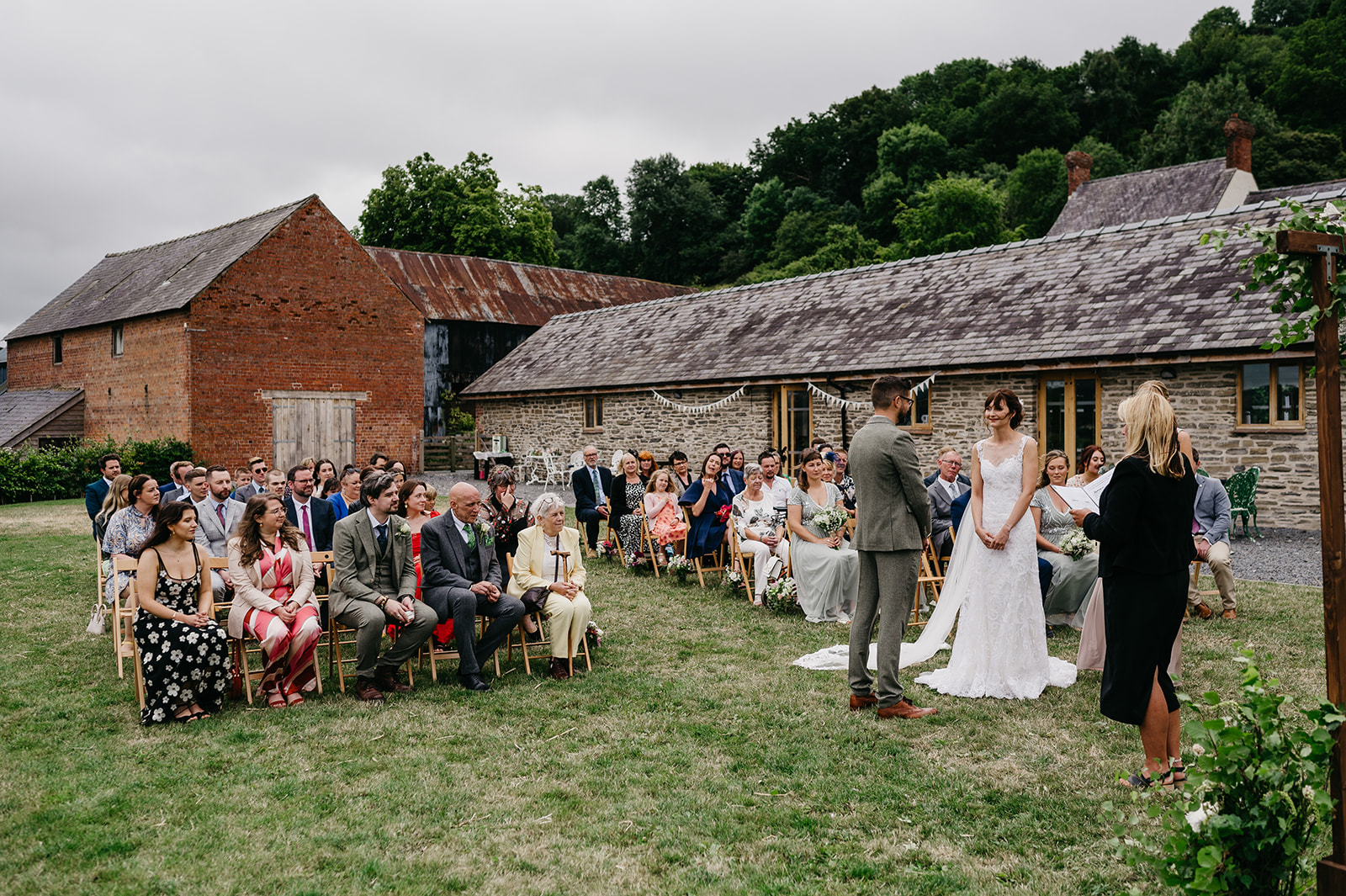 Outdoor wedding ceremony at Camlad Barns