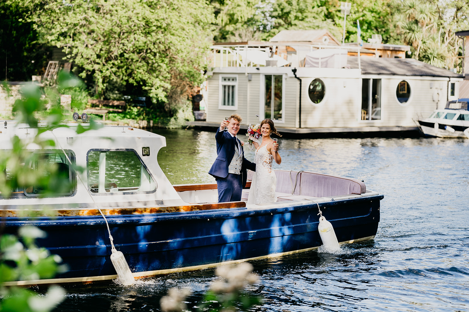 Bride and groom arrive from the River Thames by boat