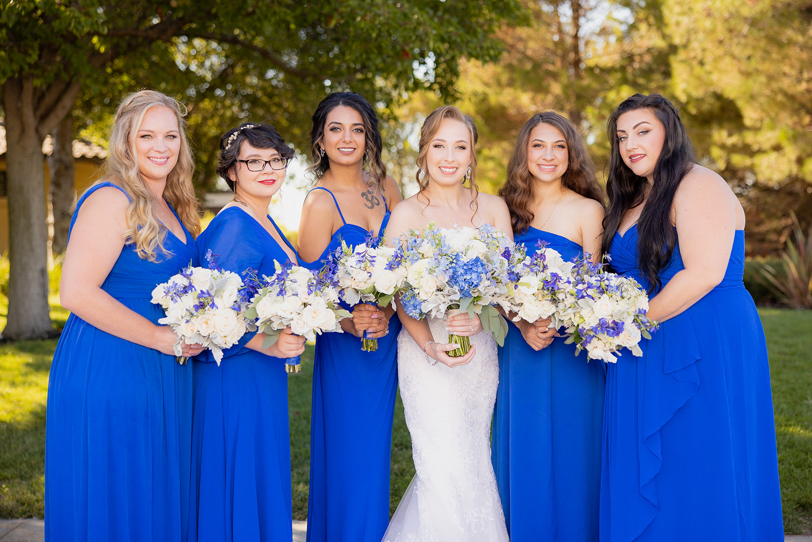 a bride with her bridesmaids at wyndham garden without a first look