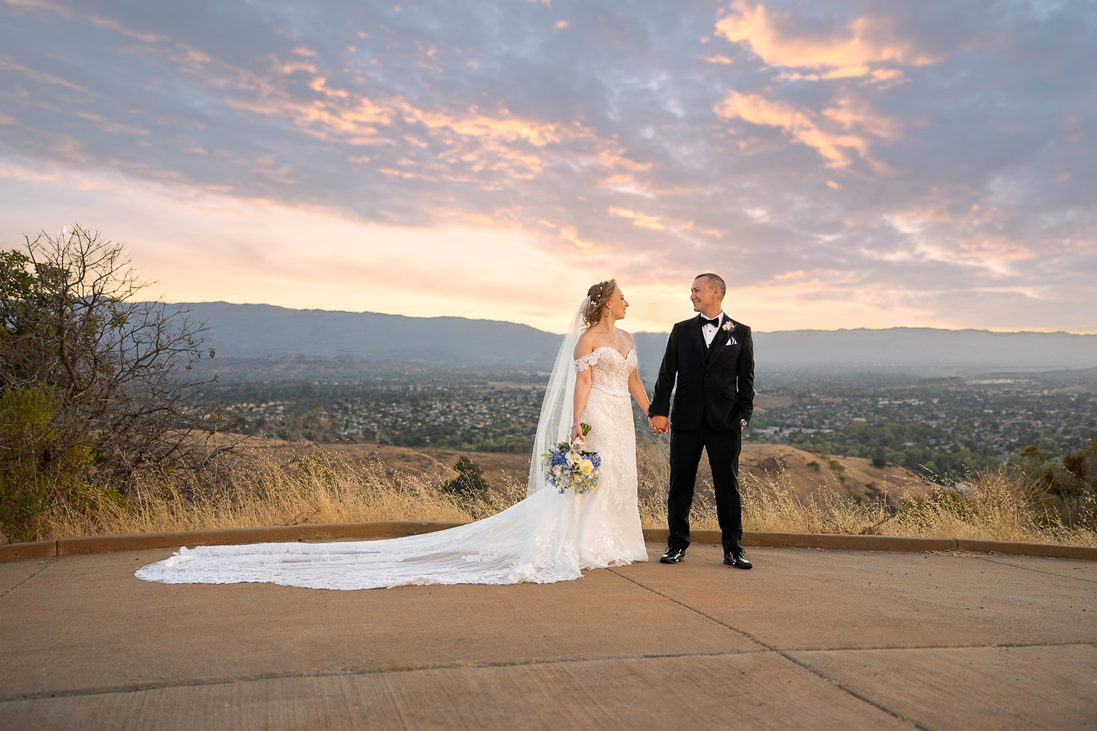 a couple with a beautiful evening sky background at the ranch at silver creek without a first look