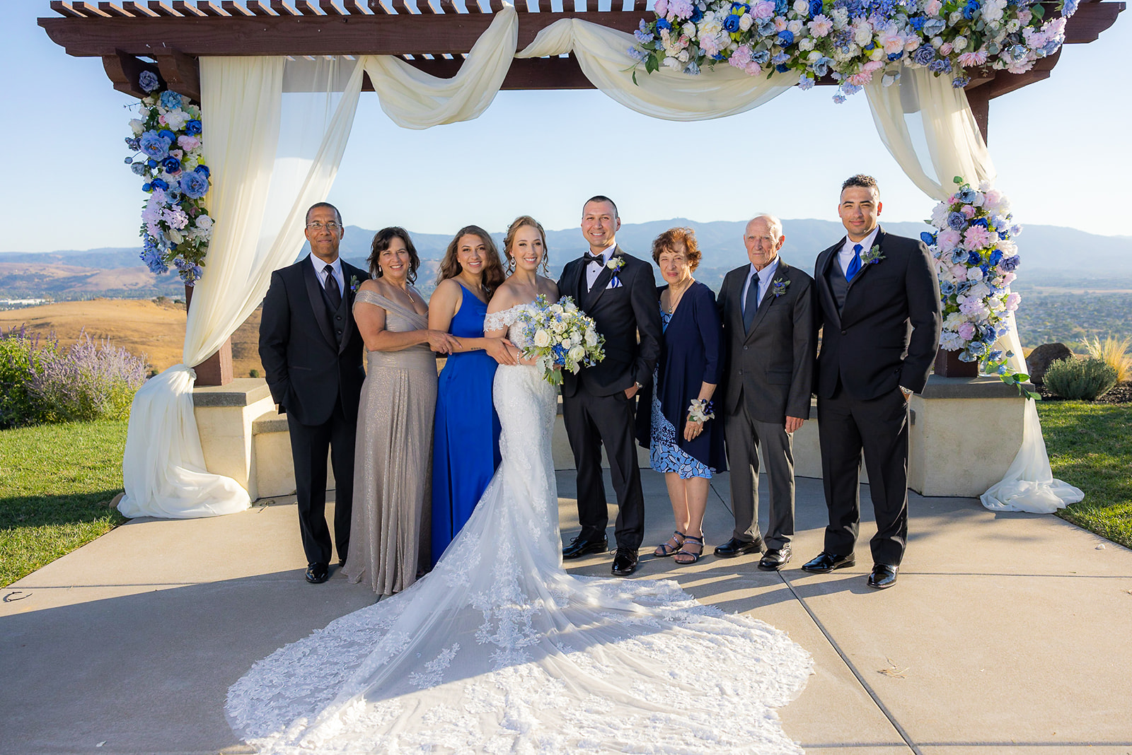a couple at the alter with their extended family at The Ranch at Silver Creek by Wedgewood Weddings without a first look