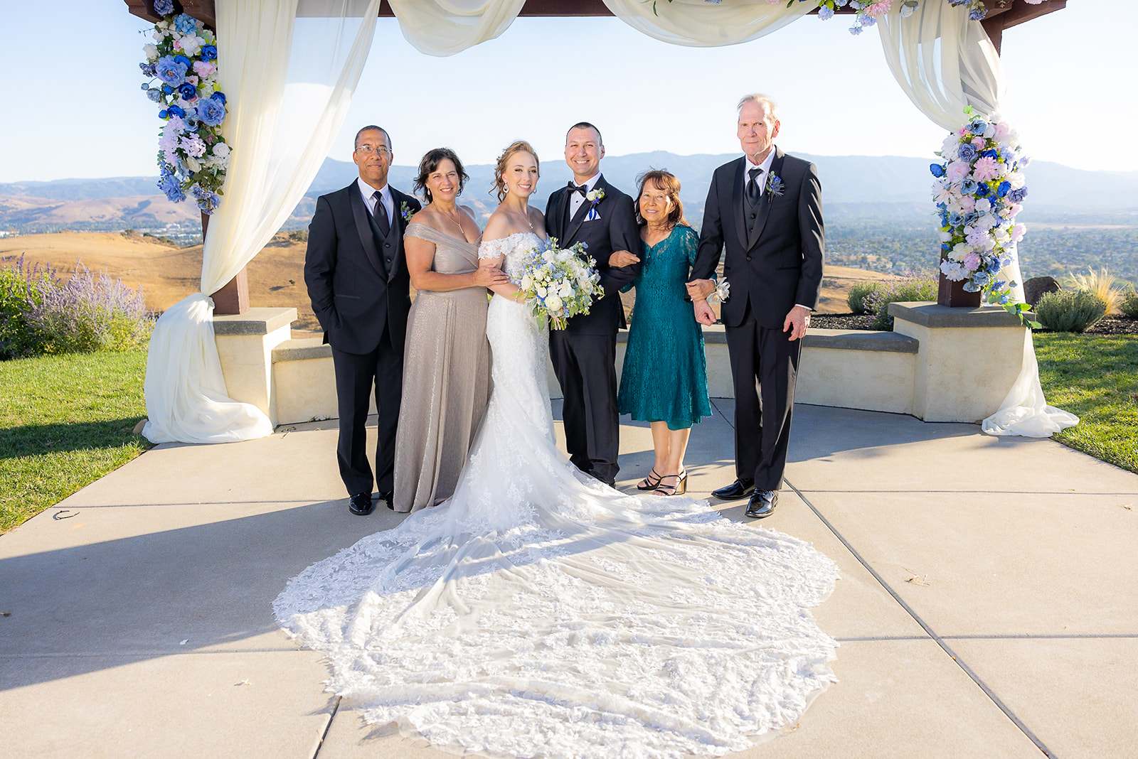 a couple at the alter with their family at The Ranch at Silver Creek by Wedgewood Weddings without a first look