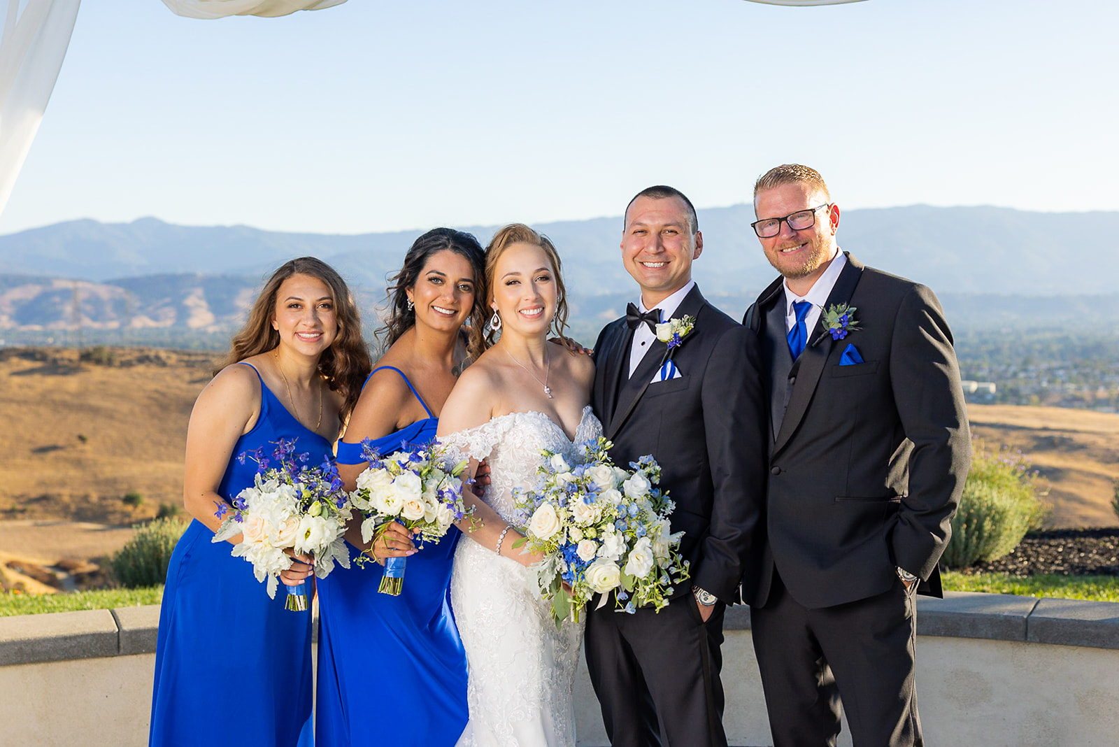 a couple with their family at the alter at the ranch at silver creek without a first look