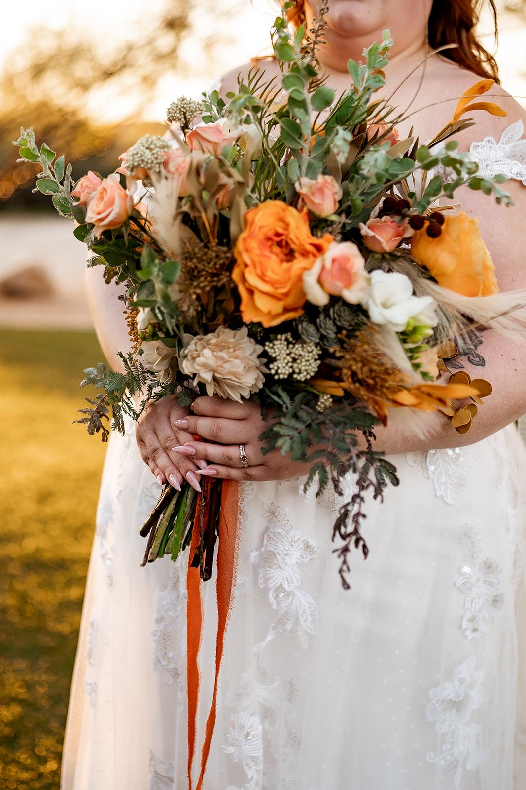 bride holding bouquet at saguaro buttes wedding venue