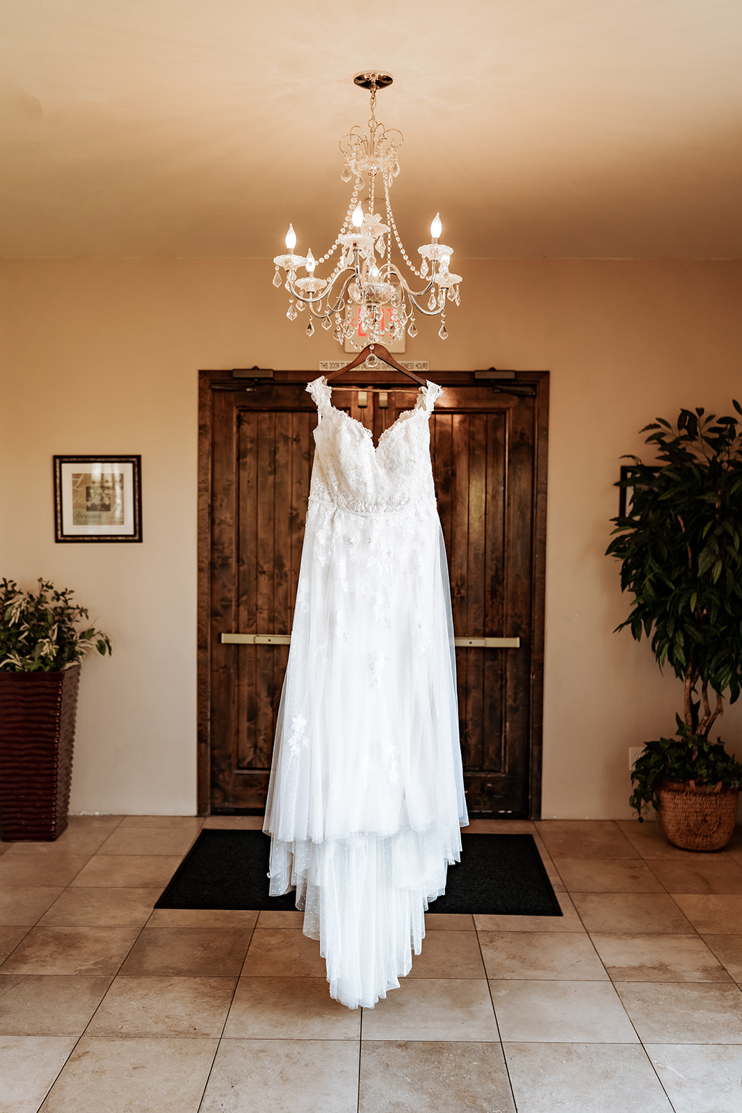 wedding dress hanging at saguaro buttes wedding venue