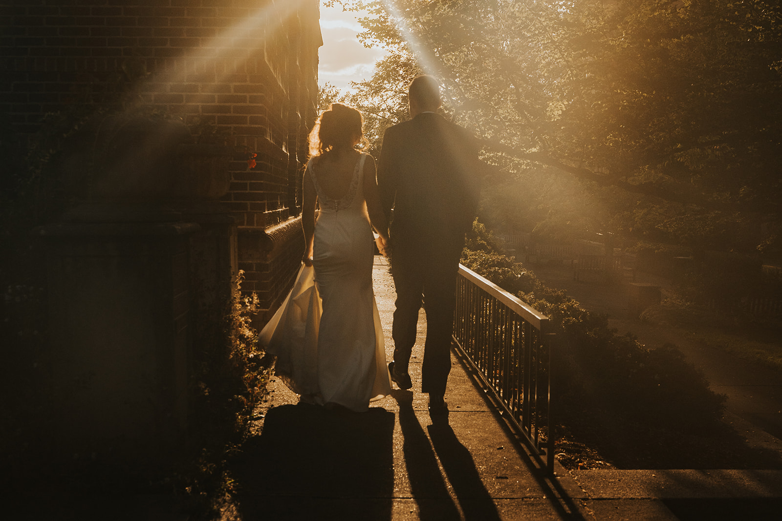 Bride and groom during golden hour at UO Eugene