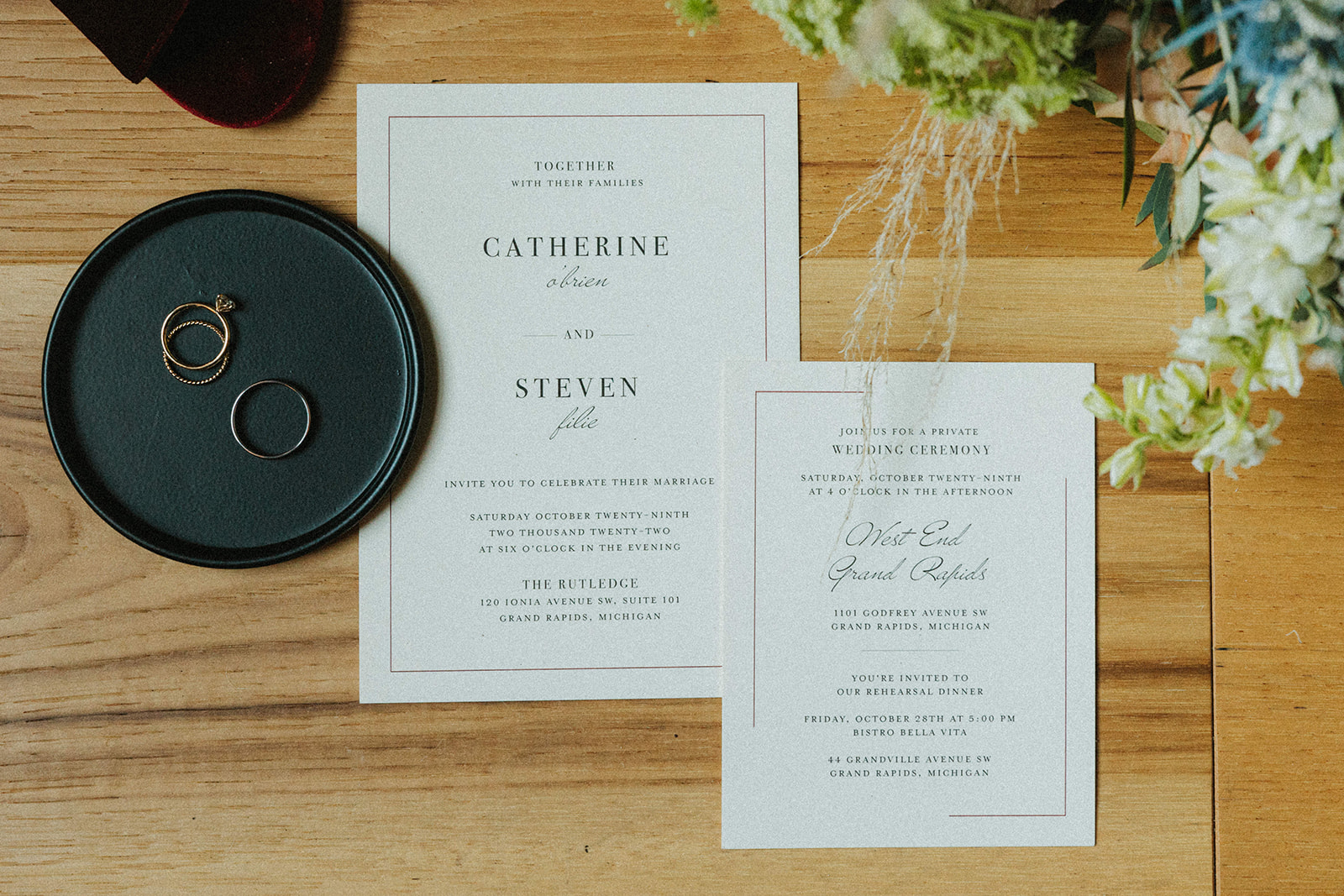 Downtown Grand Rapids Wedding invitations in a layflat photograph.