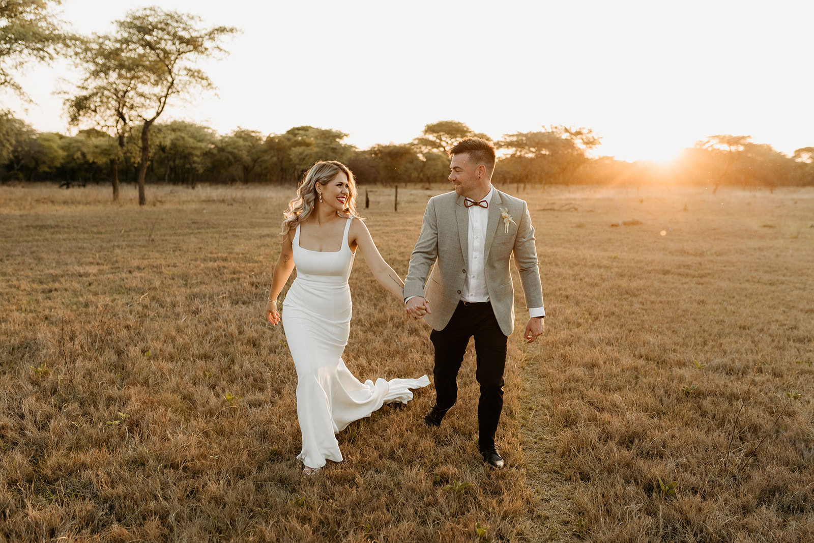 Bride and groom at sunset in the bushveld