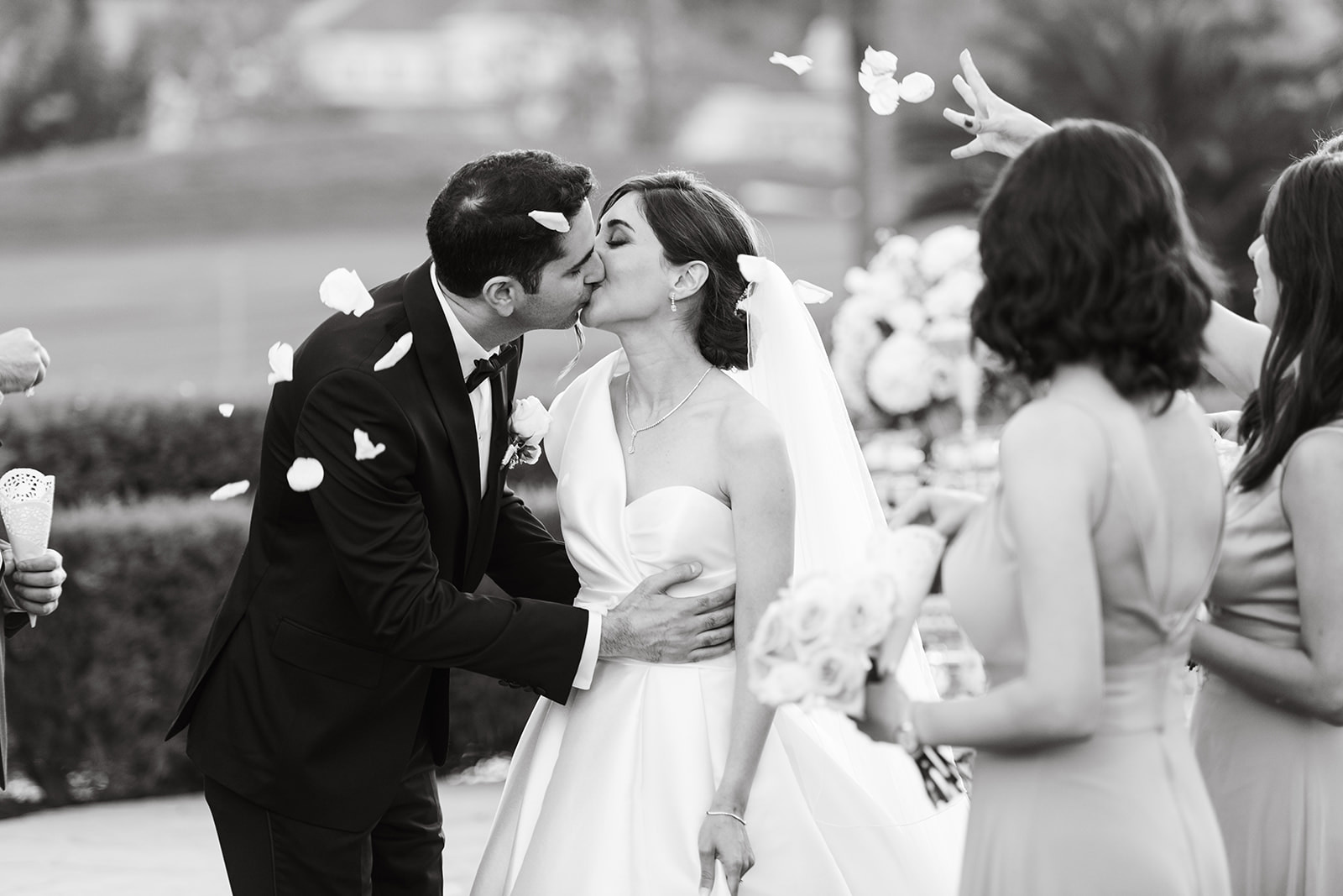 a couple kiss after getting married at Silver Creek Country Club