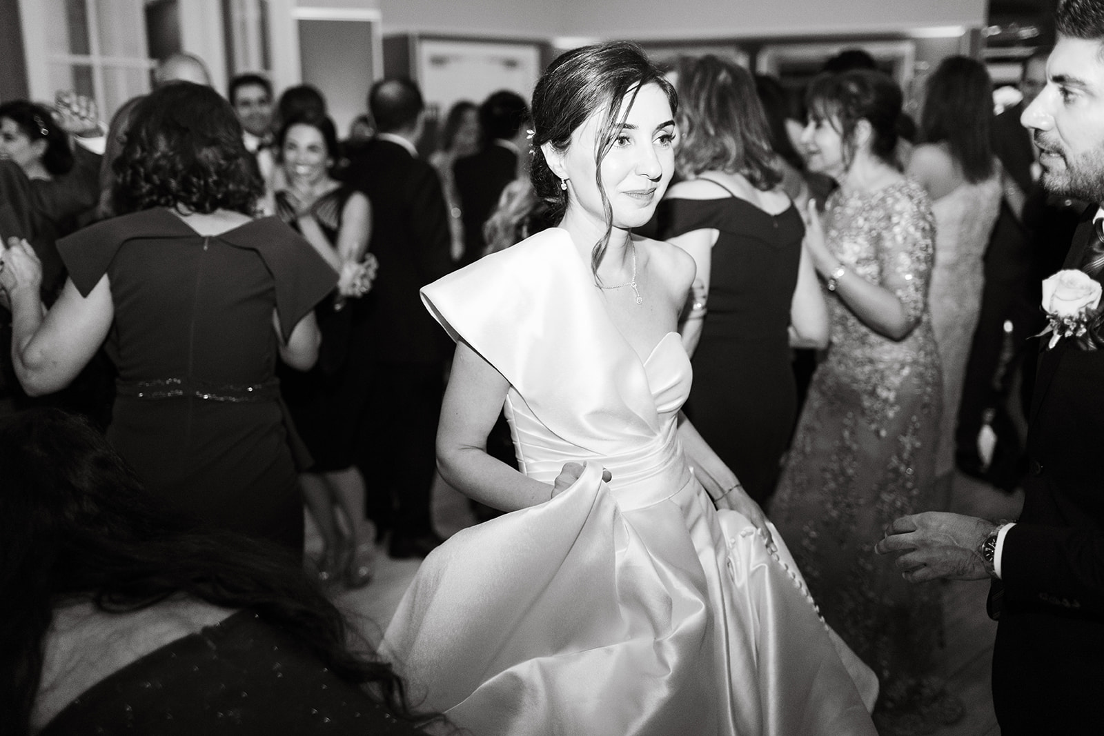 a bride on the dance floor at her wedding reception