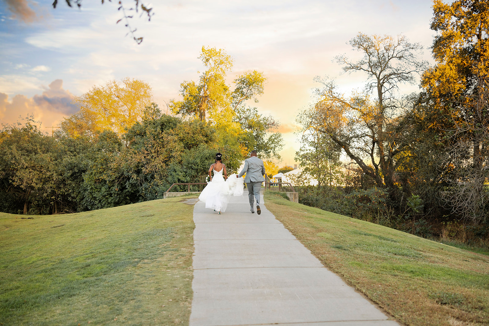 a couple walking at their post wedding couples portrait session at the pavilion at haggin oaks
