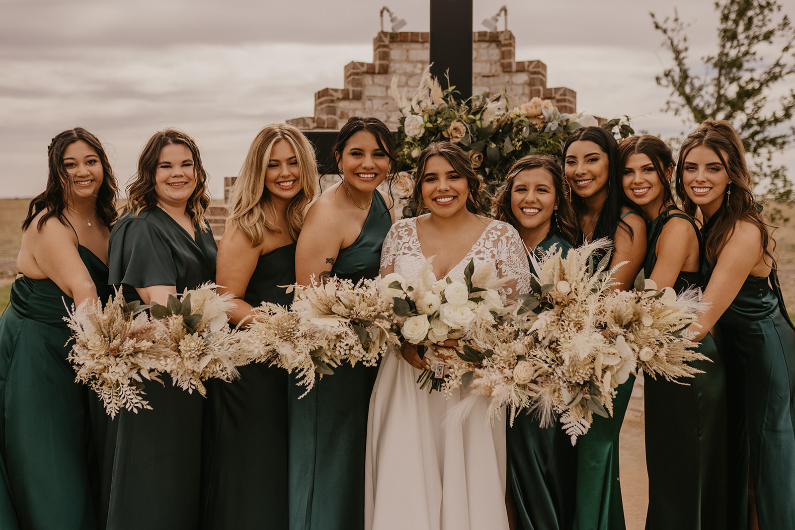West Texas bridesmaid poses in backyard wedding