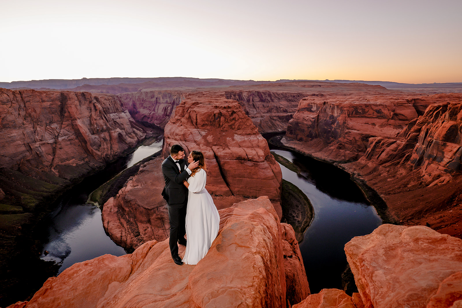 Adventure elopement in Arizona. Sunset at Horseshoe Bend