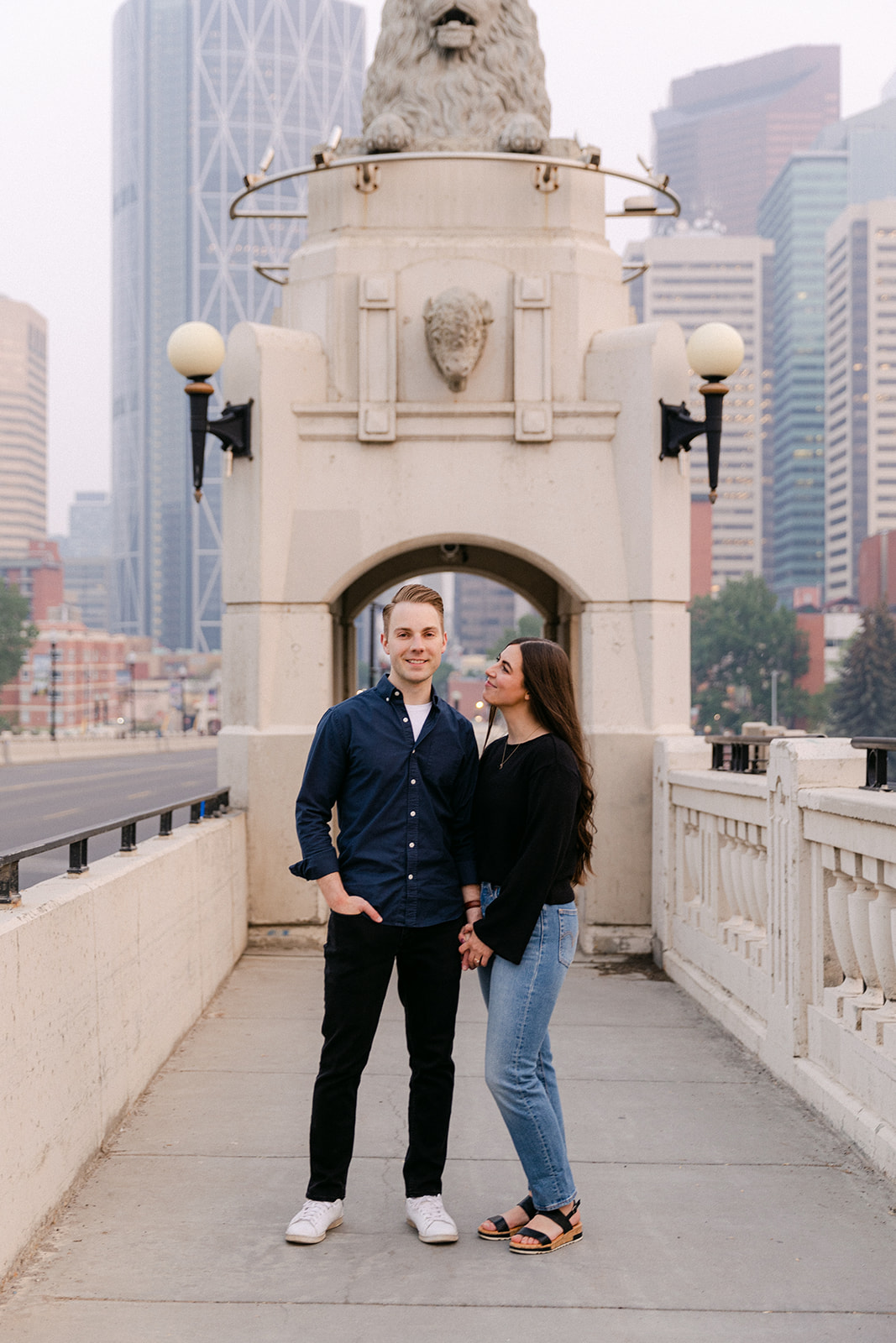 Downtown Calgary Classic and Casual engagement photography, photographs at Centre Street Bridge and Prince's Island Park