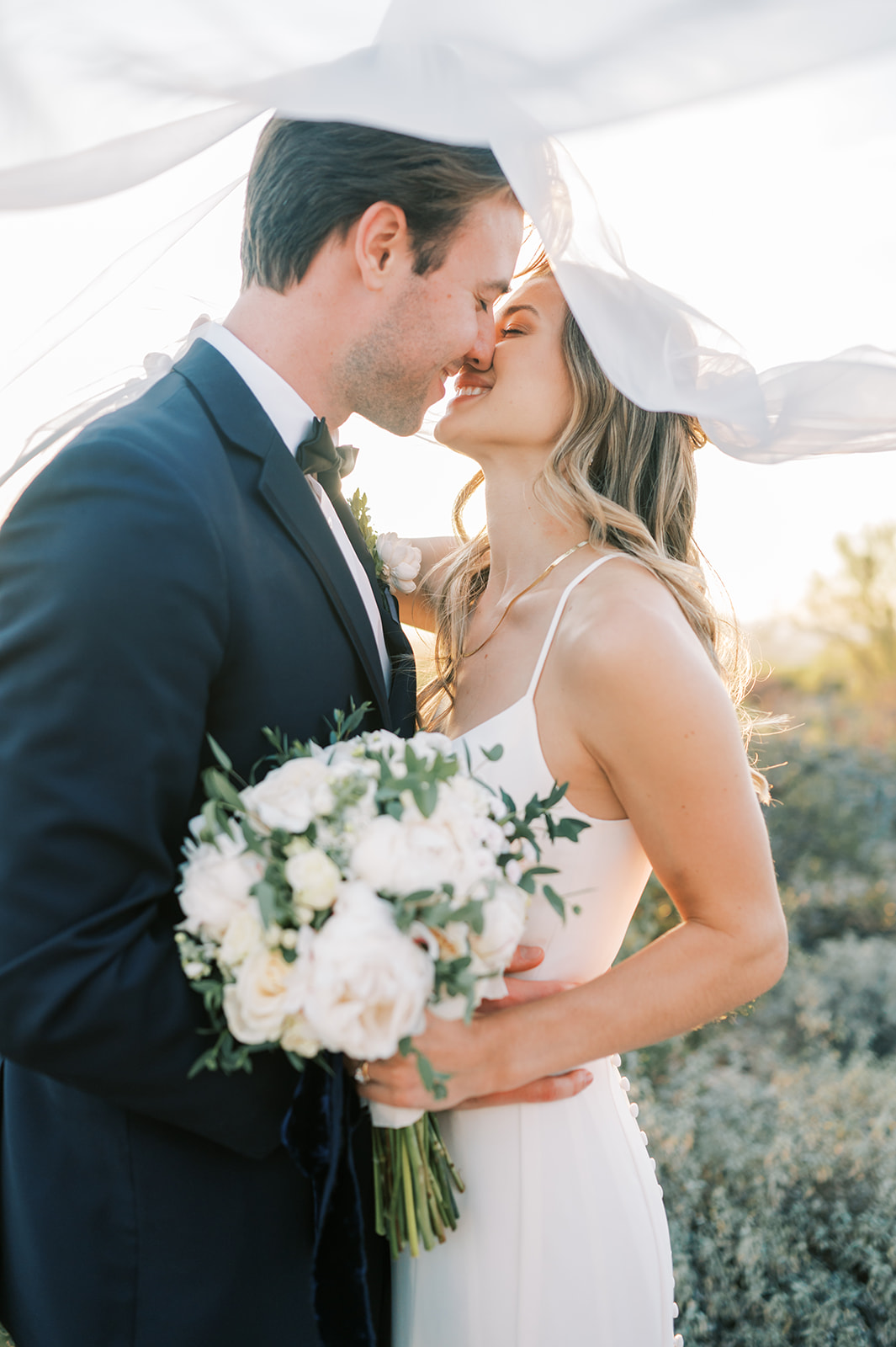 Bride and Groom with bouquet, wedding photography in Tucson, Arizona 