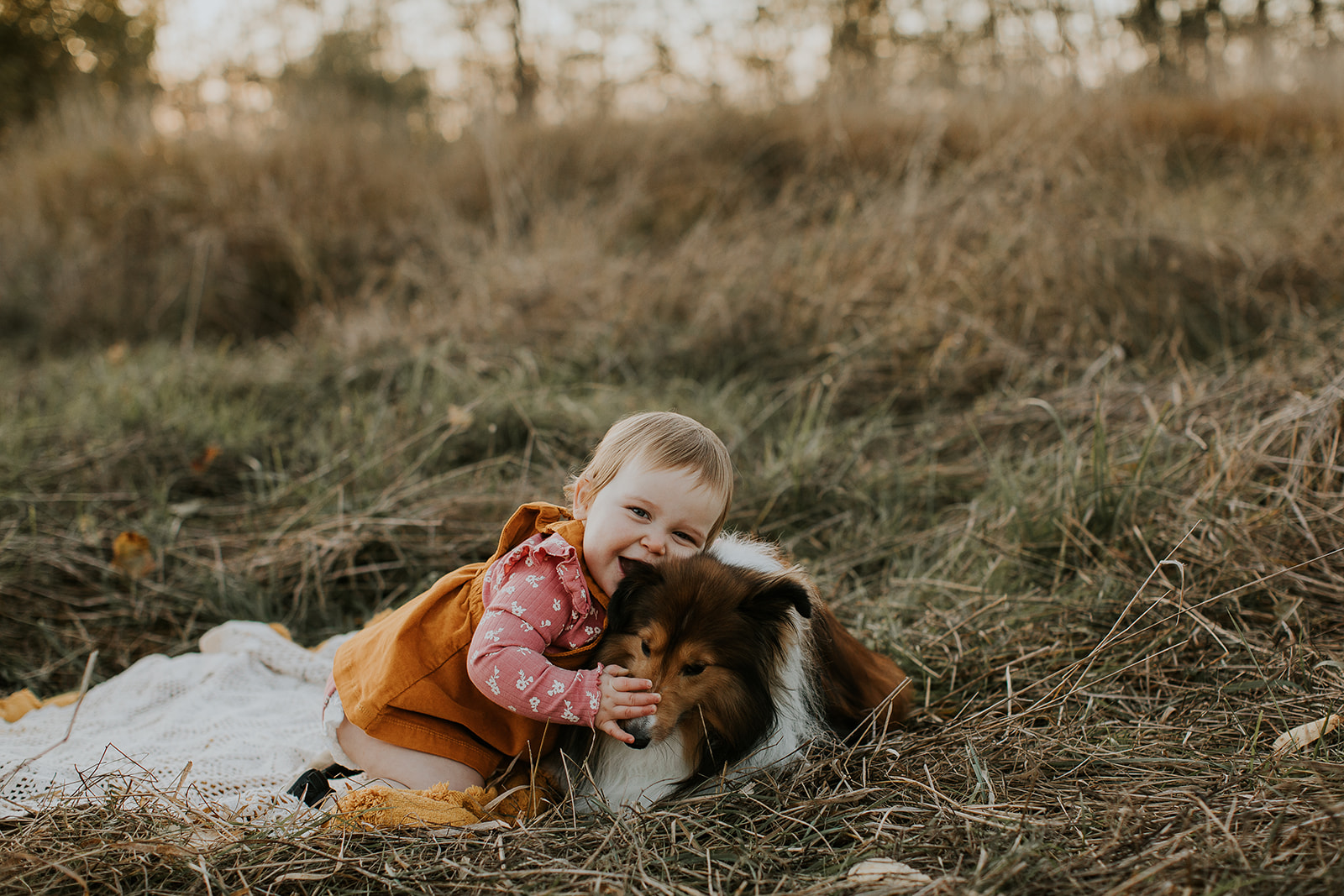one year old with dog
