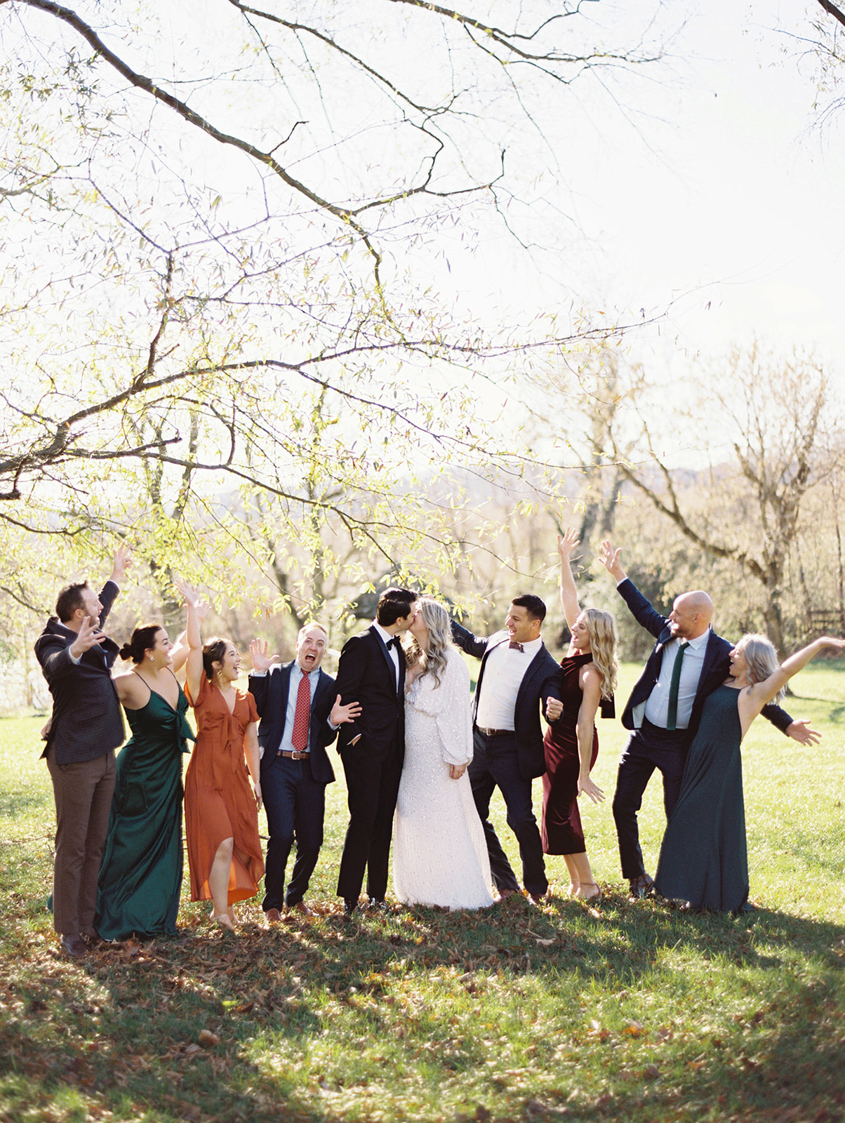 bride and groom kiss groomsmen and bridesmaids pictures post ceremony pictures elegant wedding pictures