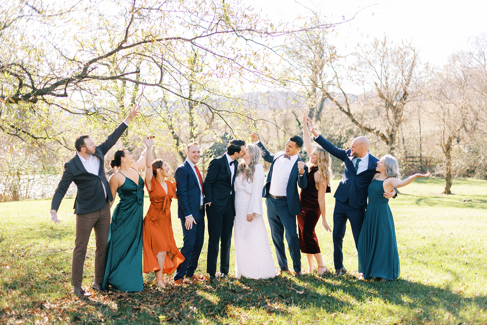 bride and groom kiss groomsmen and bridesmaids pictures post ceremony pictures  elegant wedding pictures
