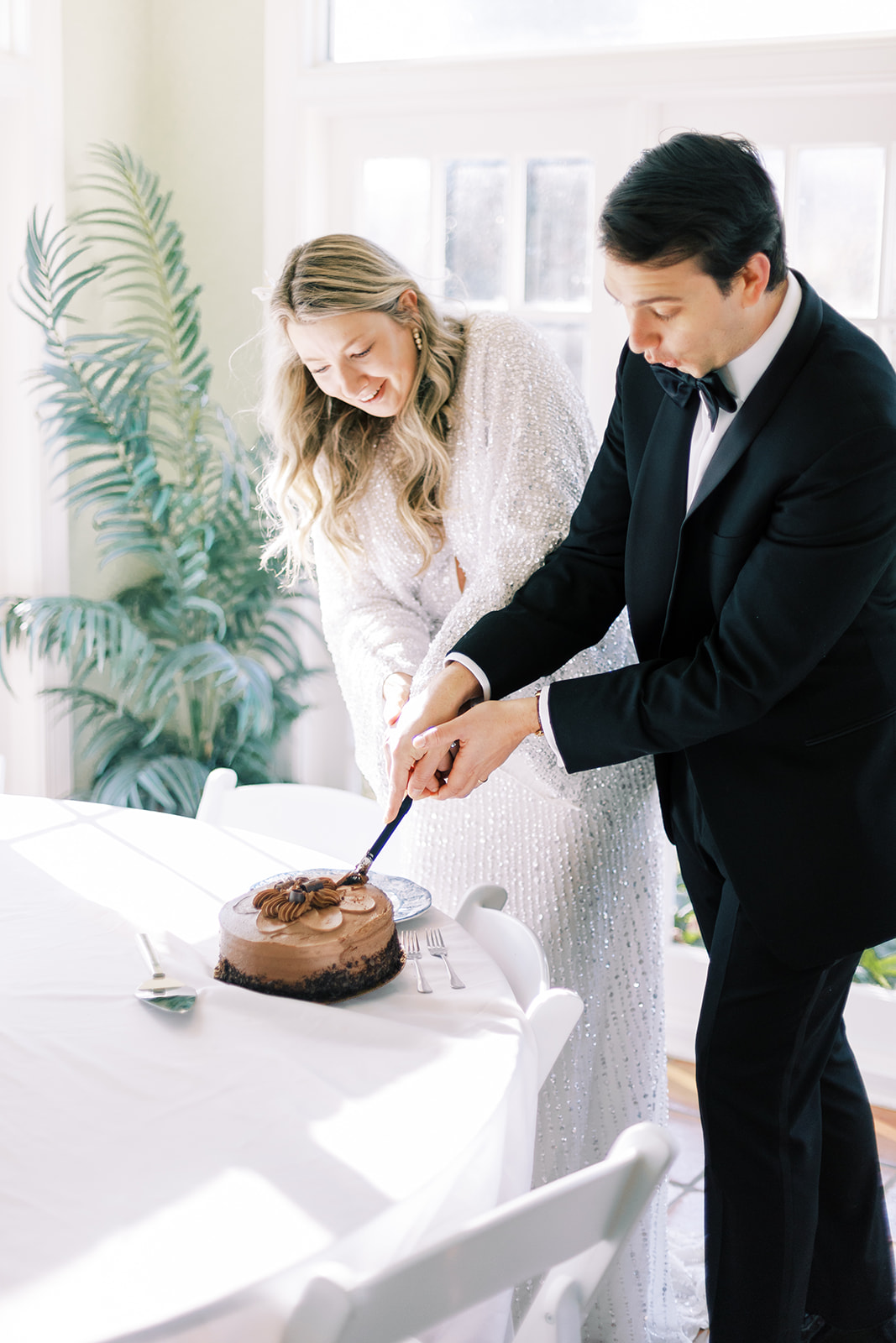 white wedding decor brown cake chocolate wedding cake v neck wedding dress black and white tux blue china cake cutting