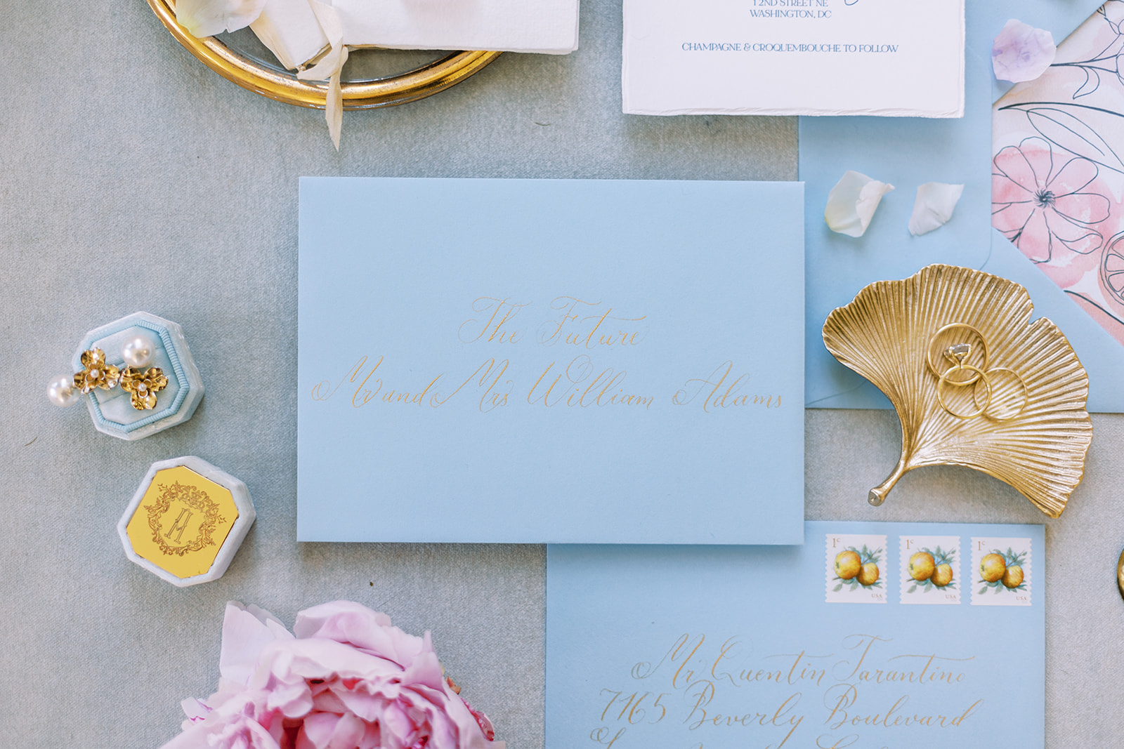 golden wedding details ginko leaf gold pearl earrings blue wedding invitation pink flowers pink peony butterfly decor 