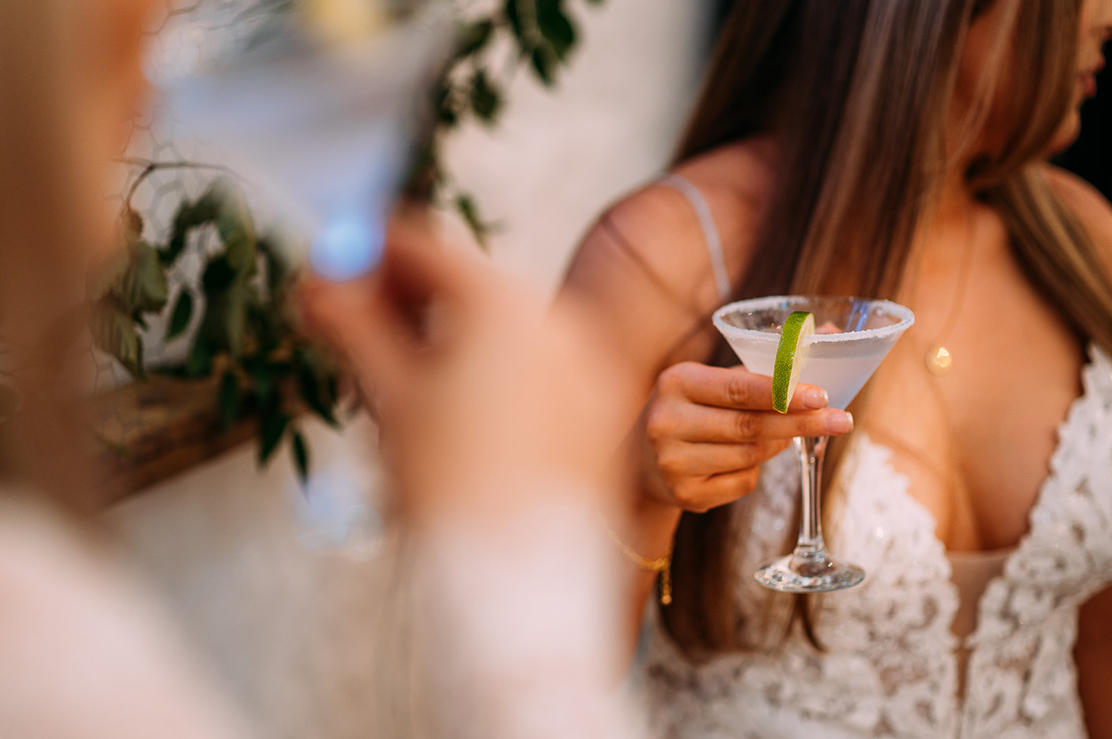 Brides drinking cocktails.