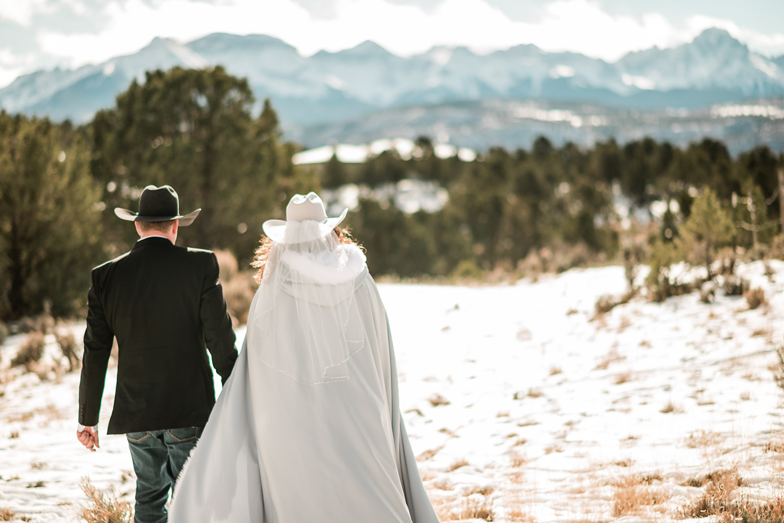 Day after wedding adventure session in the winter in Ridgway Colorado, with views of Mt. Sneffels