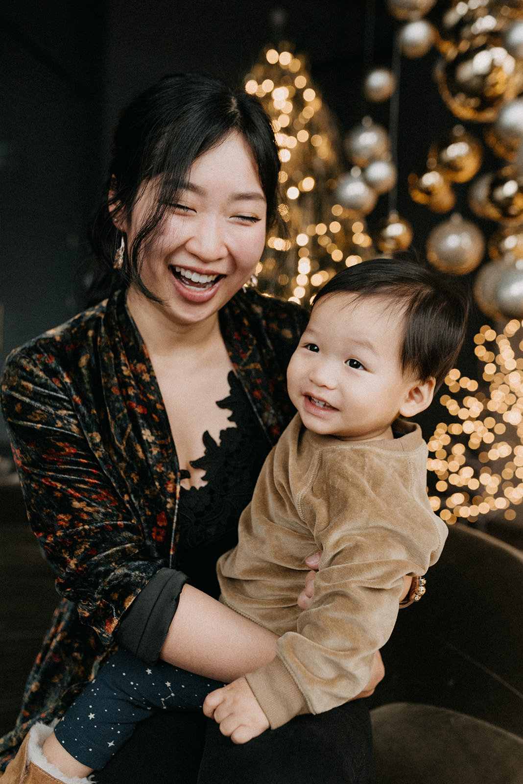 Joyful mother and son photo with Christmas vibes