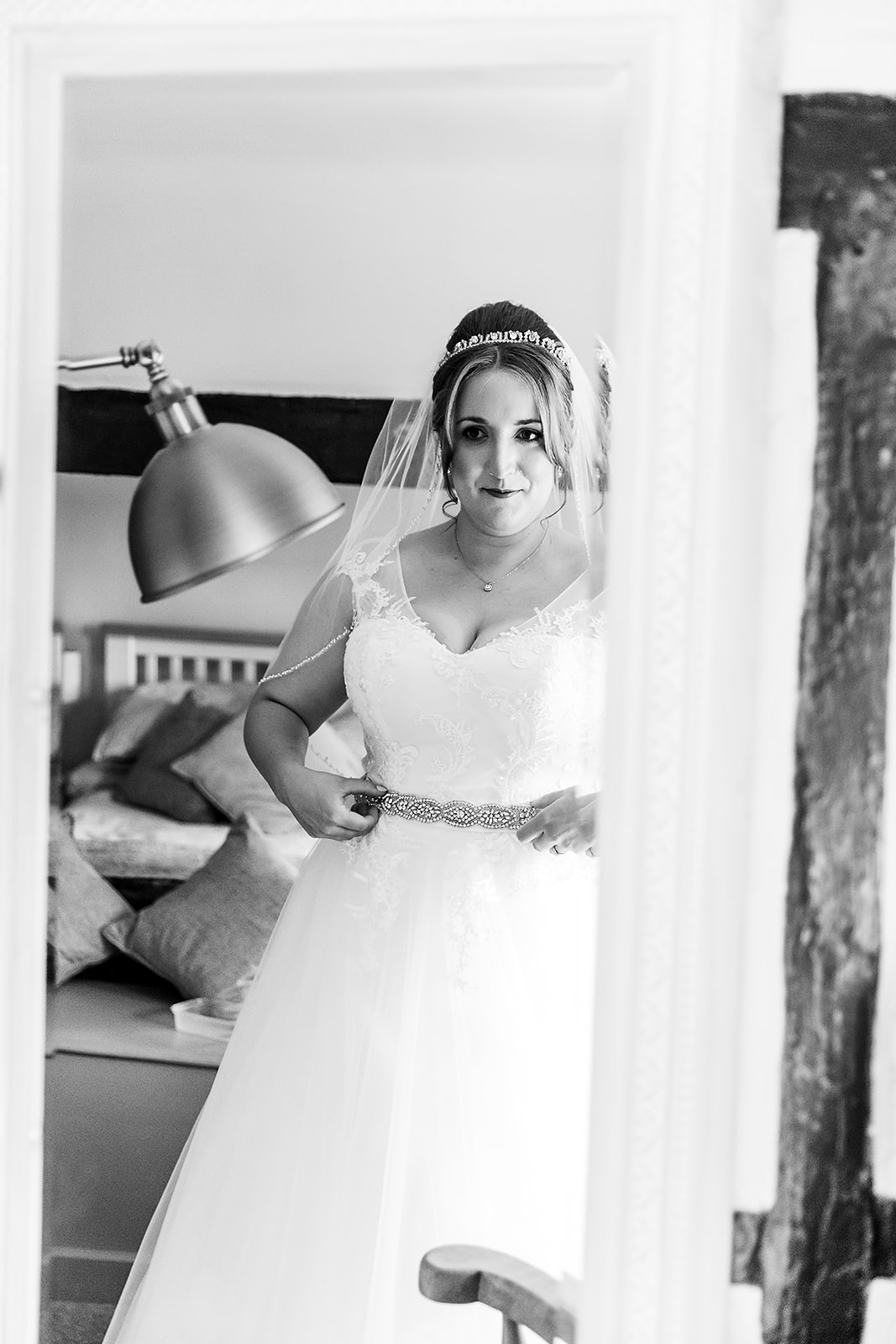 Bride looking in the mirror in her wedding dress Dagnall. Wedding Photo by Perfect Memories Photography