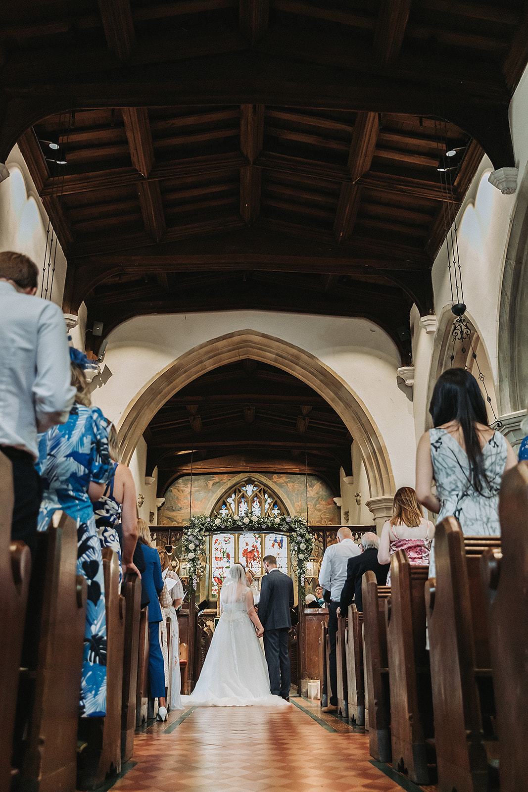 Bride and groom at the alter in Little Gaddesden Church, Hertfordshire Wedding Photo by Perfect Memories Photography