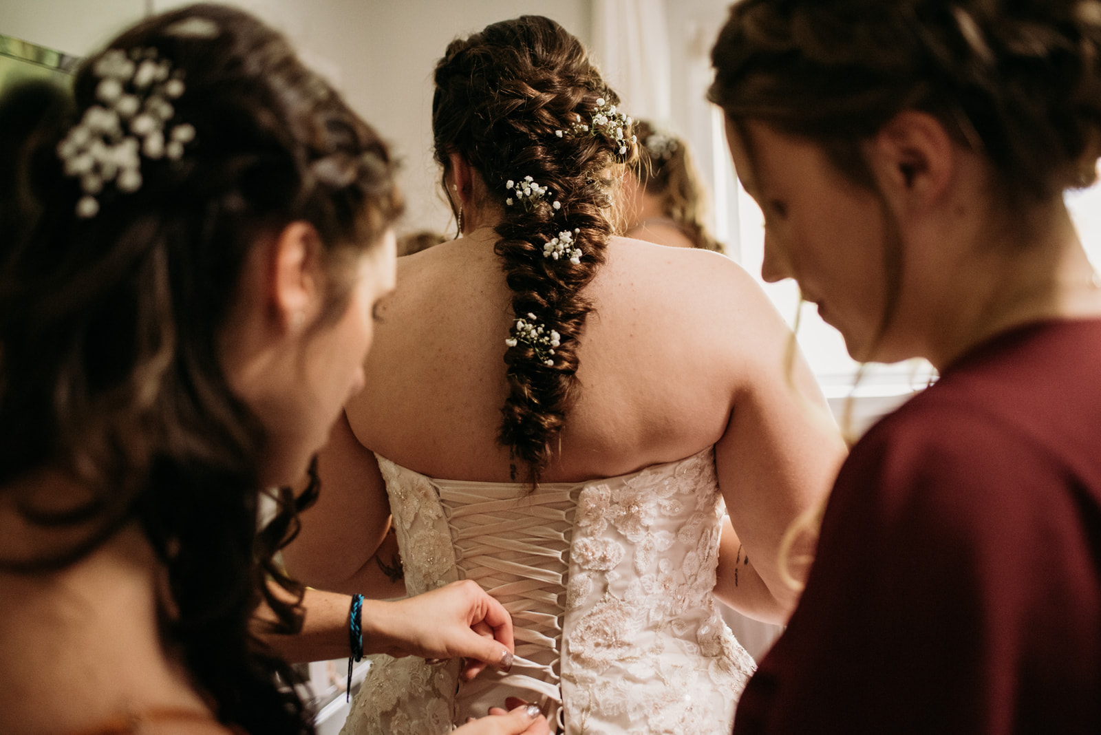 A bride getting ready on her wedding day in simcoe county, ontario. 