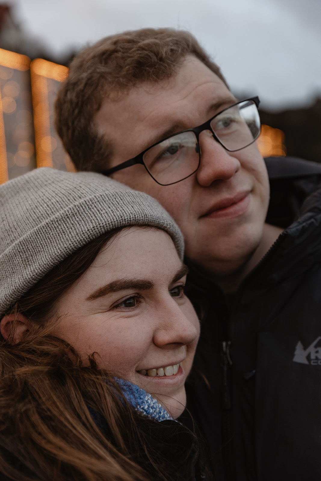 close up of a couple on their winter engagement shoot in Edinburgh