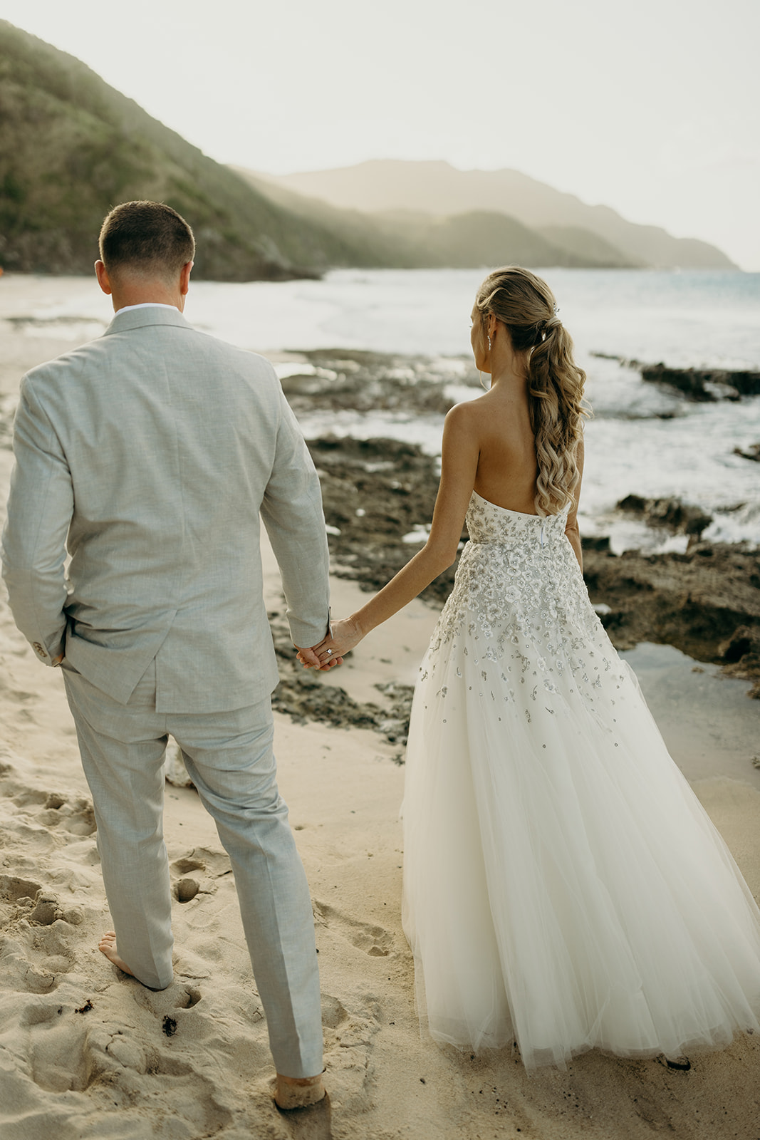 Beautiful beaded wedding dress on the beach