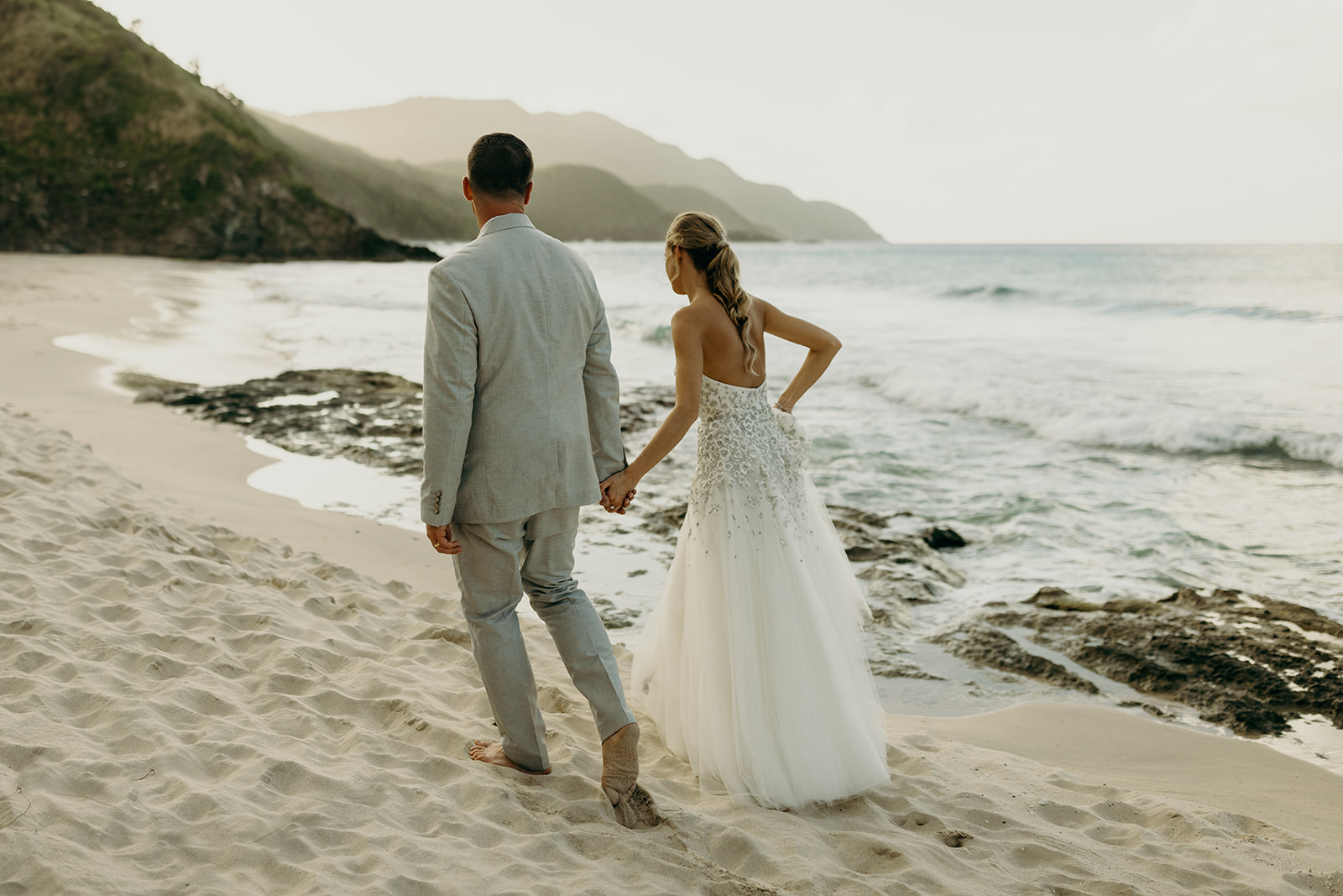 Beautiful beaded wedding dress on the beach