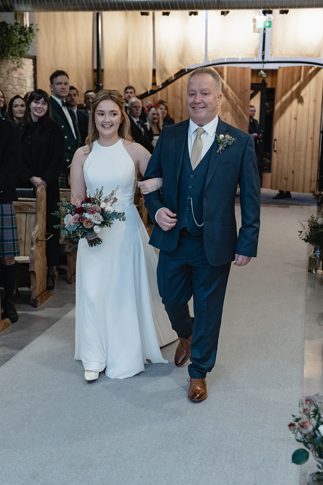 father and bride walking down the aisle at Cairns Farm Estate