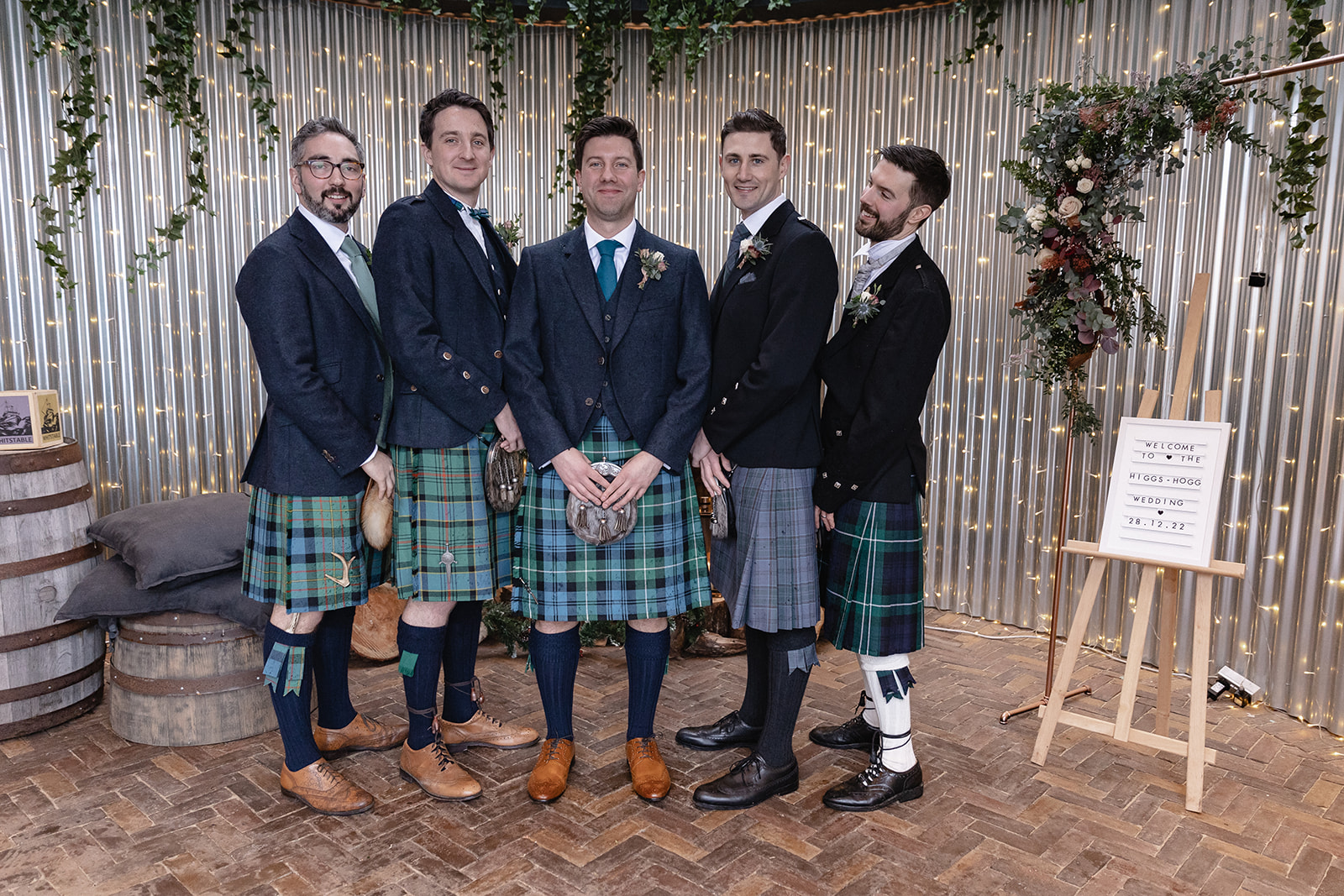 groomsmen having a laugh before the wedding at Cairns Farm Estate