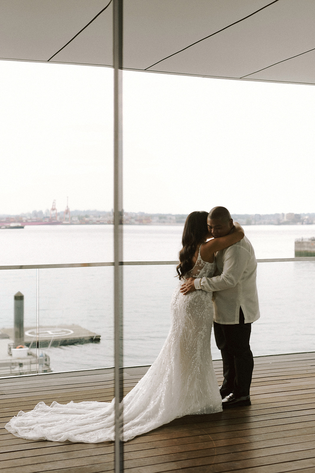 Vancouver wedding photographer captures photos of couple having their first look at Polygon Gallery