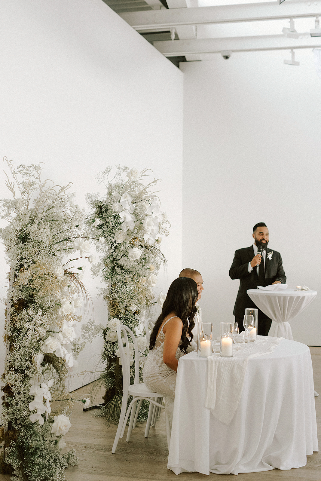 Vancouver wedding photographer captures photos of couple having their wedding at Polygon Gallery