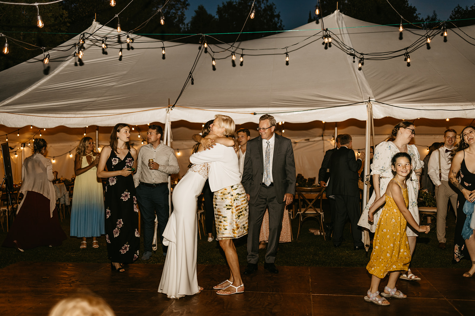 Maddie Lymburner and Chris Hartwig dancing at their wedding reception