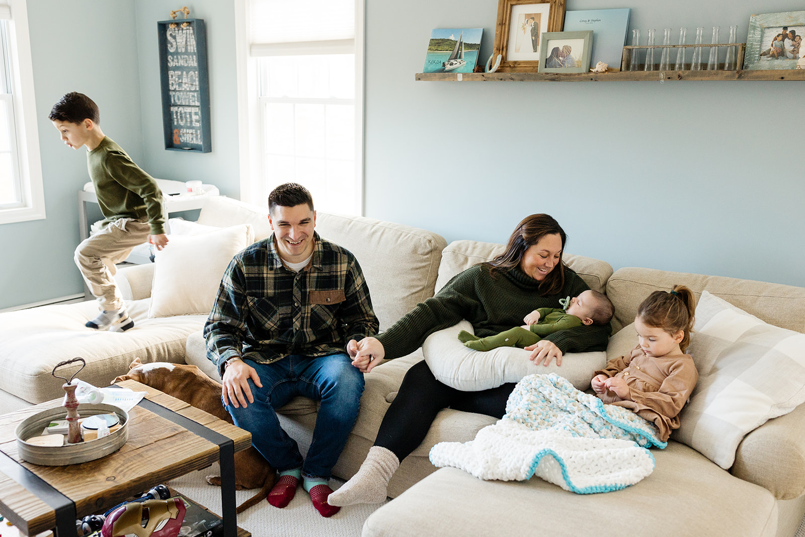 A family of five during their newborn family photo session at home in Trumbull, CT.