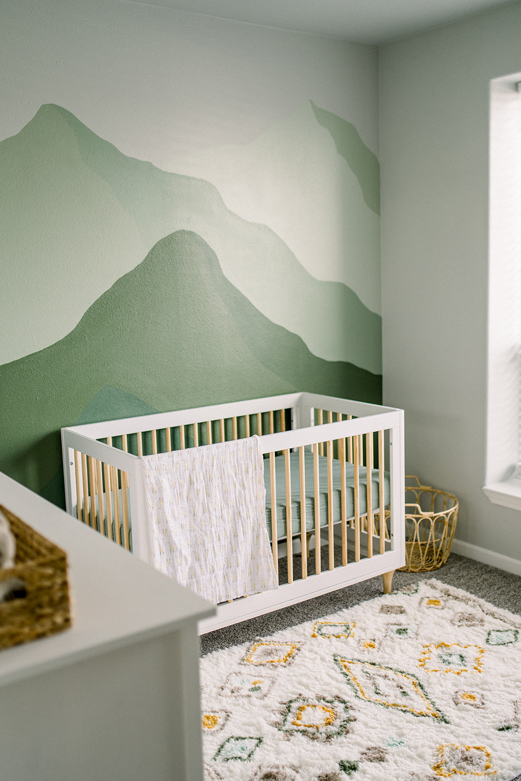 Baby crib in boy nursery at In home maternity photo shoot Sonora, CA photographer
