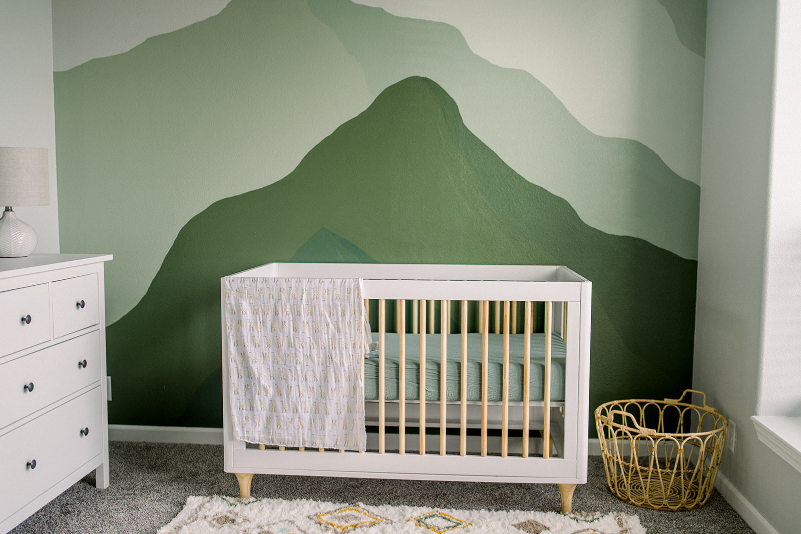 Baby crib in boy nursery at In home maternity photo shoot Sonora, CA photographer