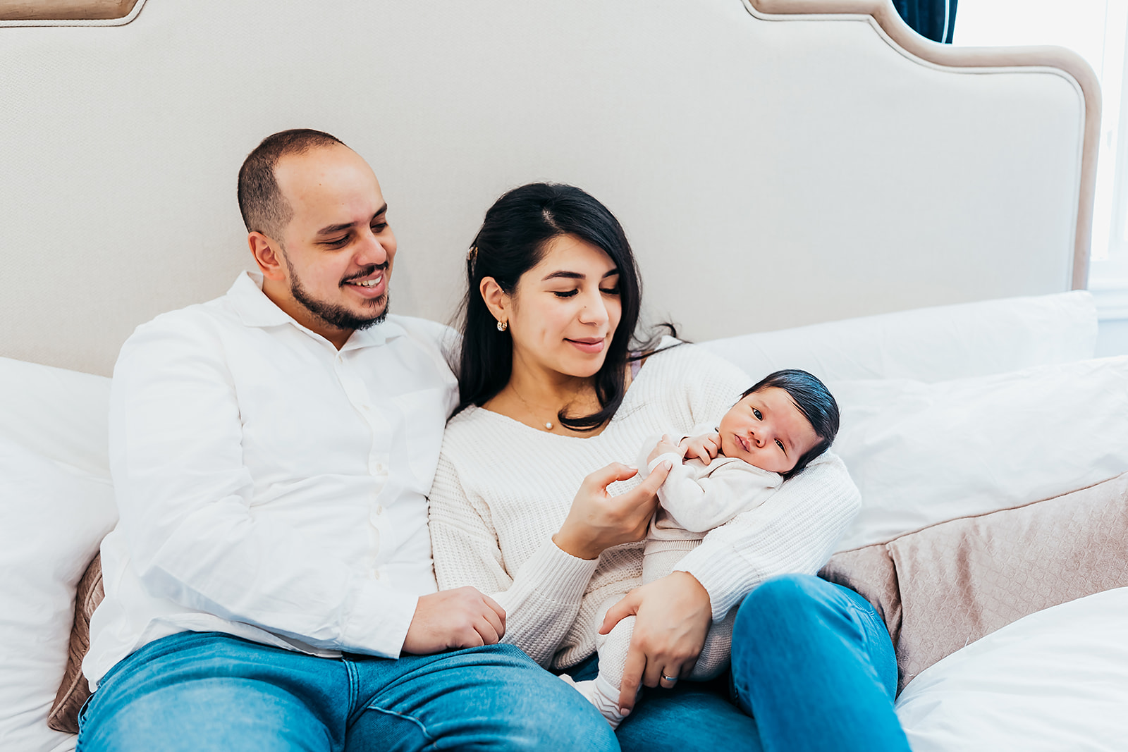 couple with newborn baby for in home newborn session