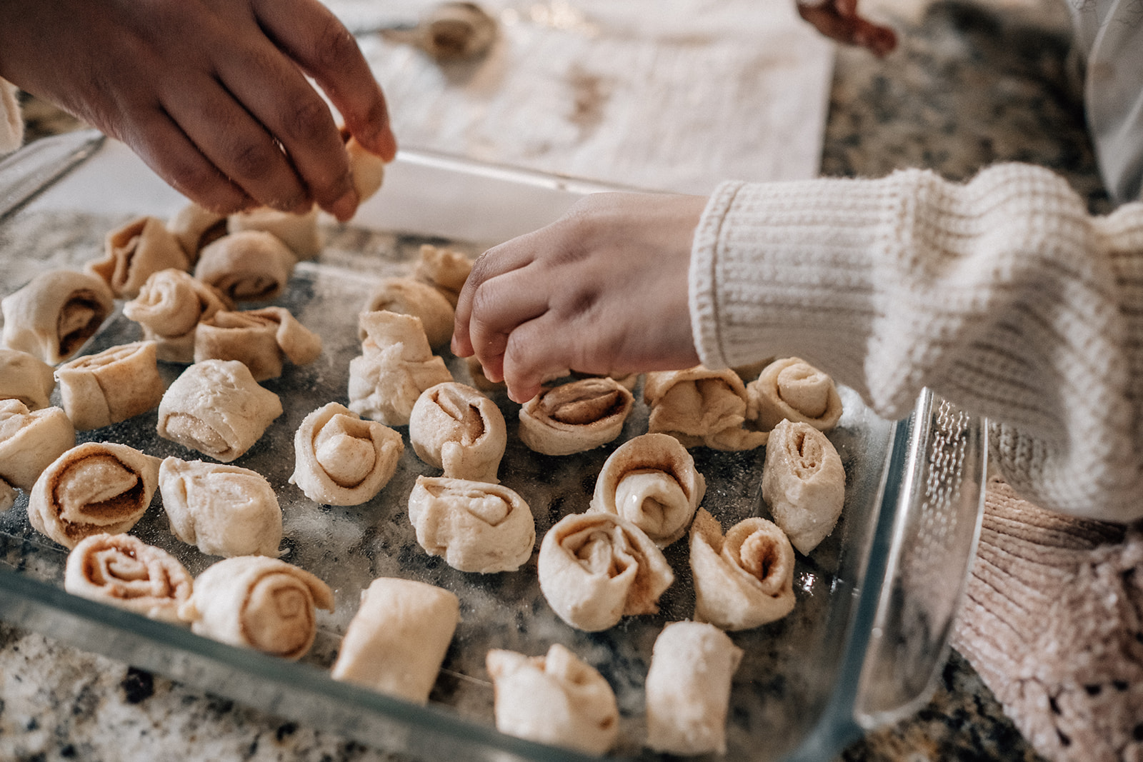 Baking cinnamon rolls with family 