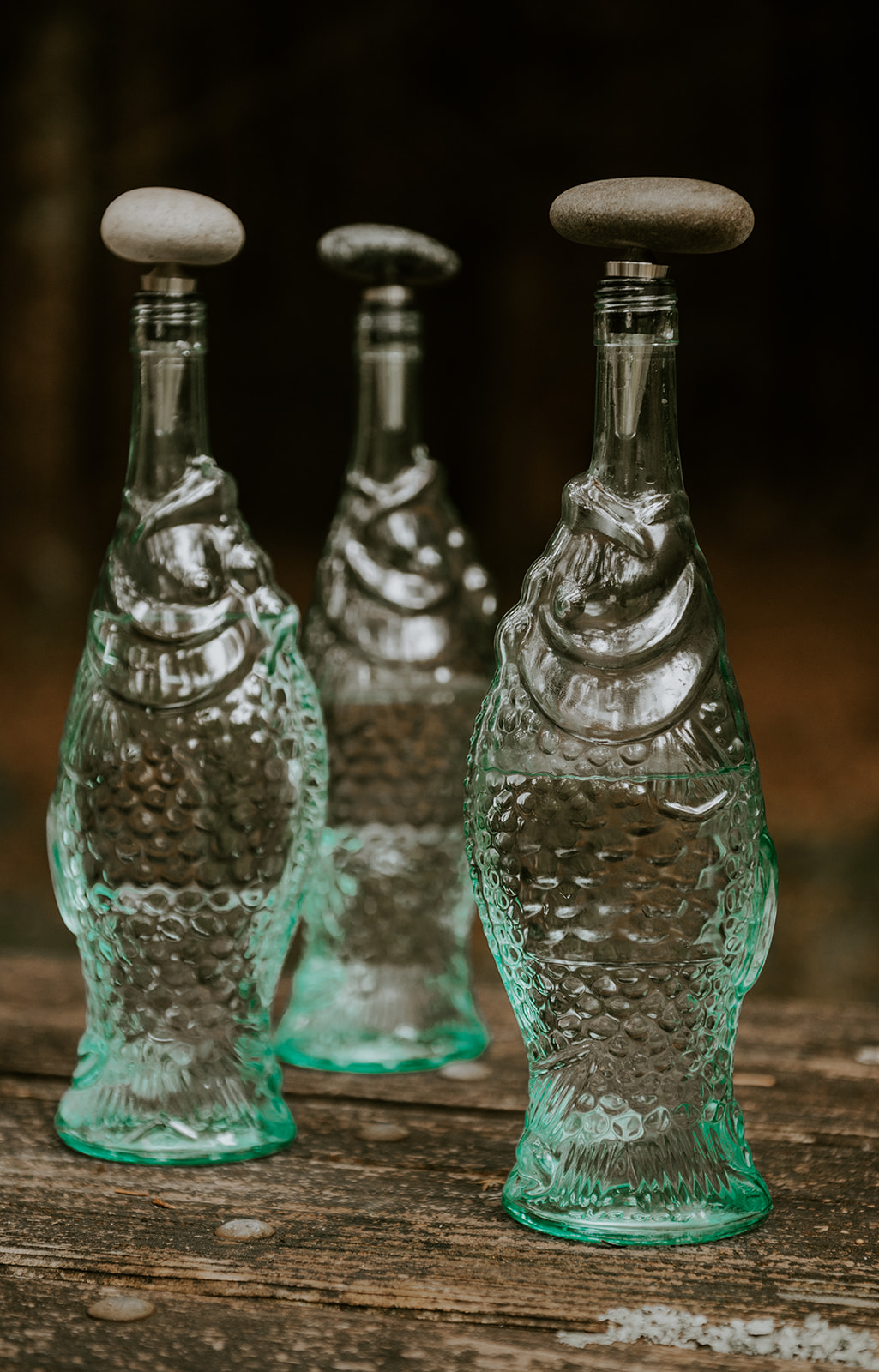Fish water bottles with rock stoppers - wedding decor