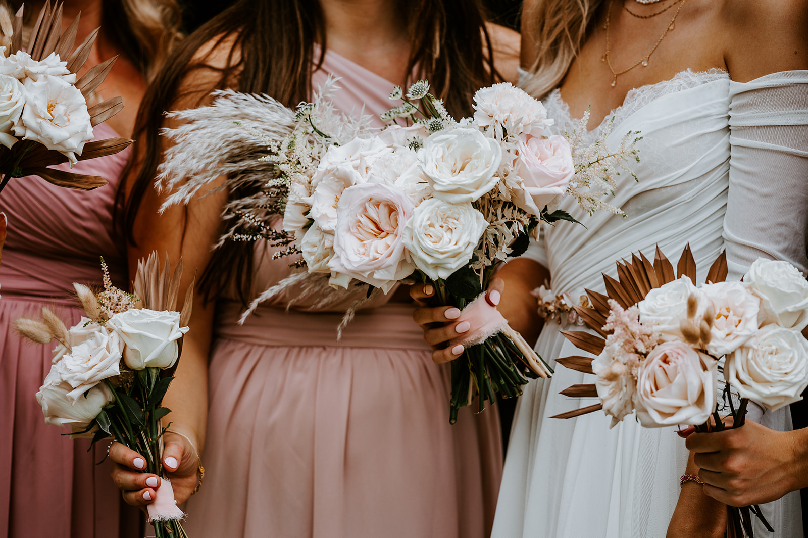 Blush wedding colors and bridal and bridesmaids bouquets