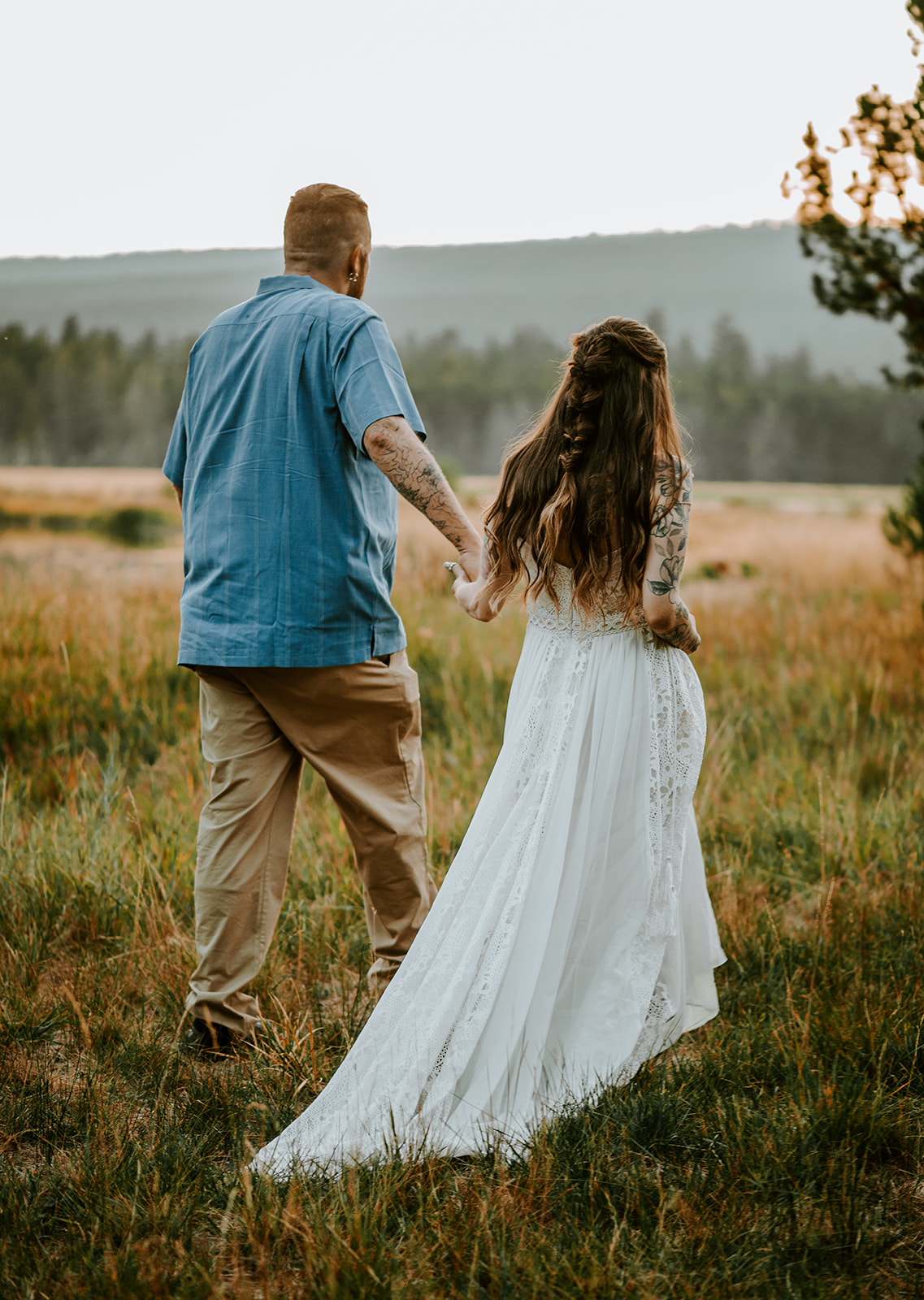 Couple walking at Dillon falls after their vow renwal